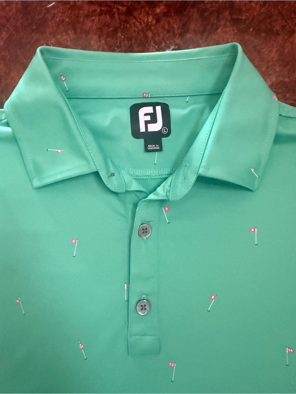 FootJoy Men’s Teal Green Golf Polo with Mini Flag Print